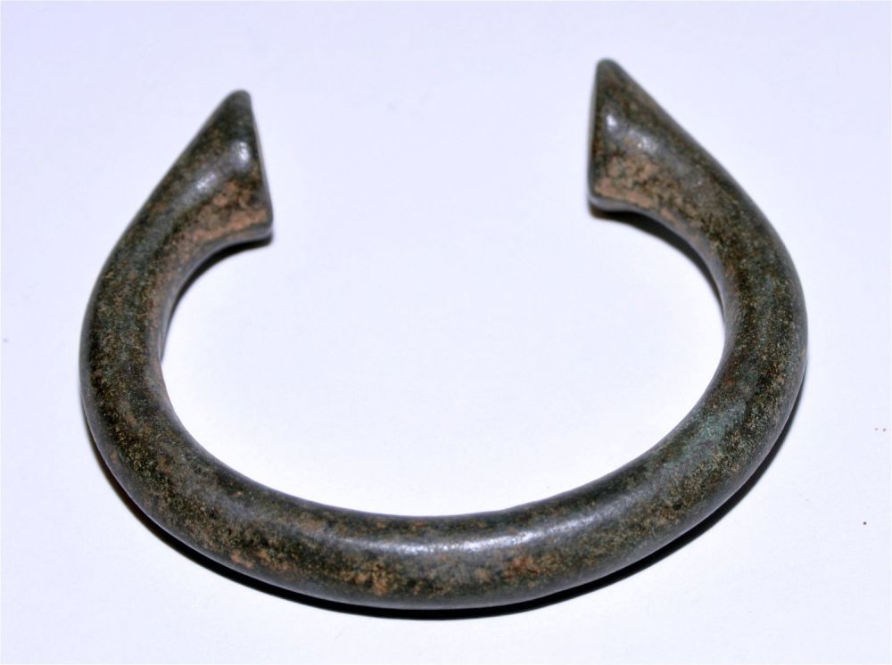 Lot 440: Bronze manilla slave bracelet