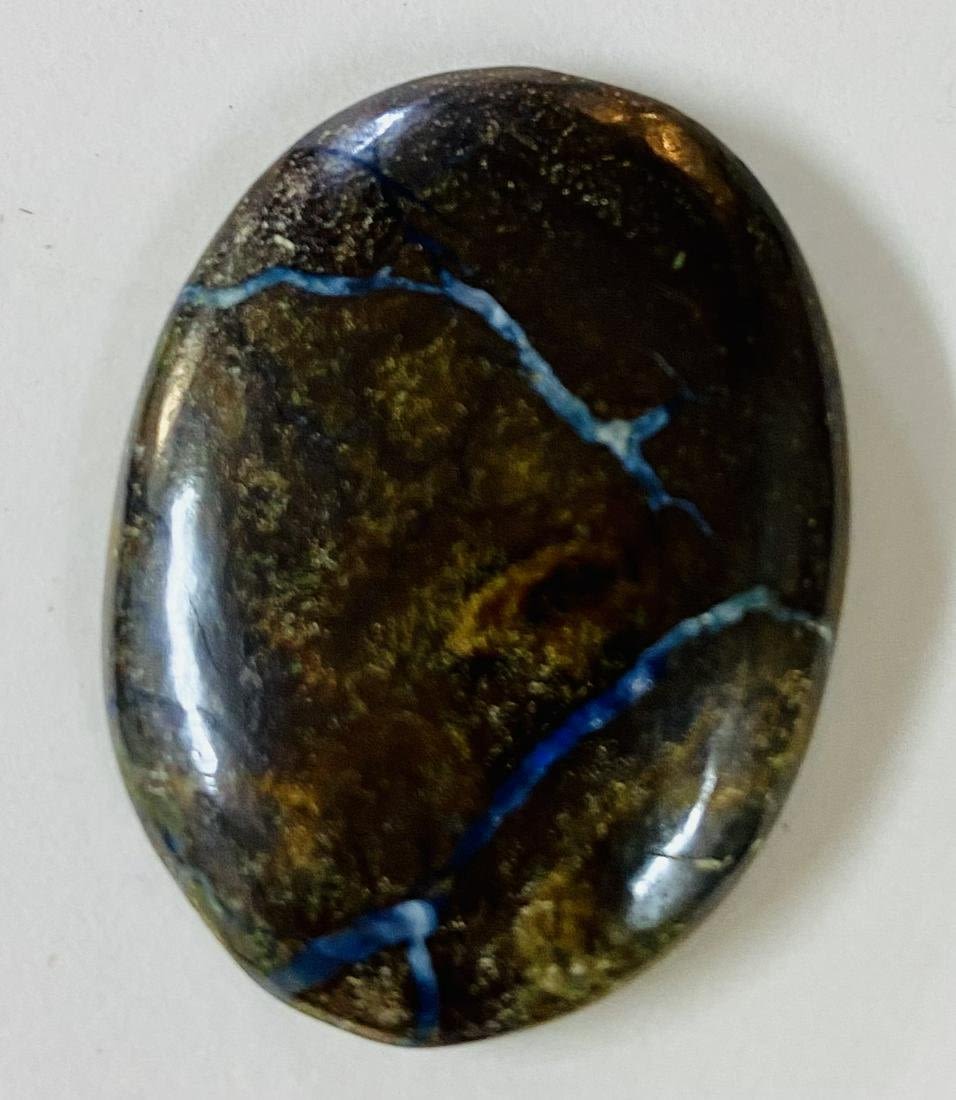 Lot 476: Opal in matrix cabochon oval
