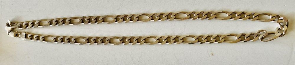Lot 154: 24 inch sterling figaro chain