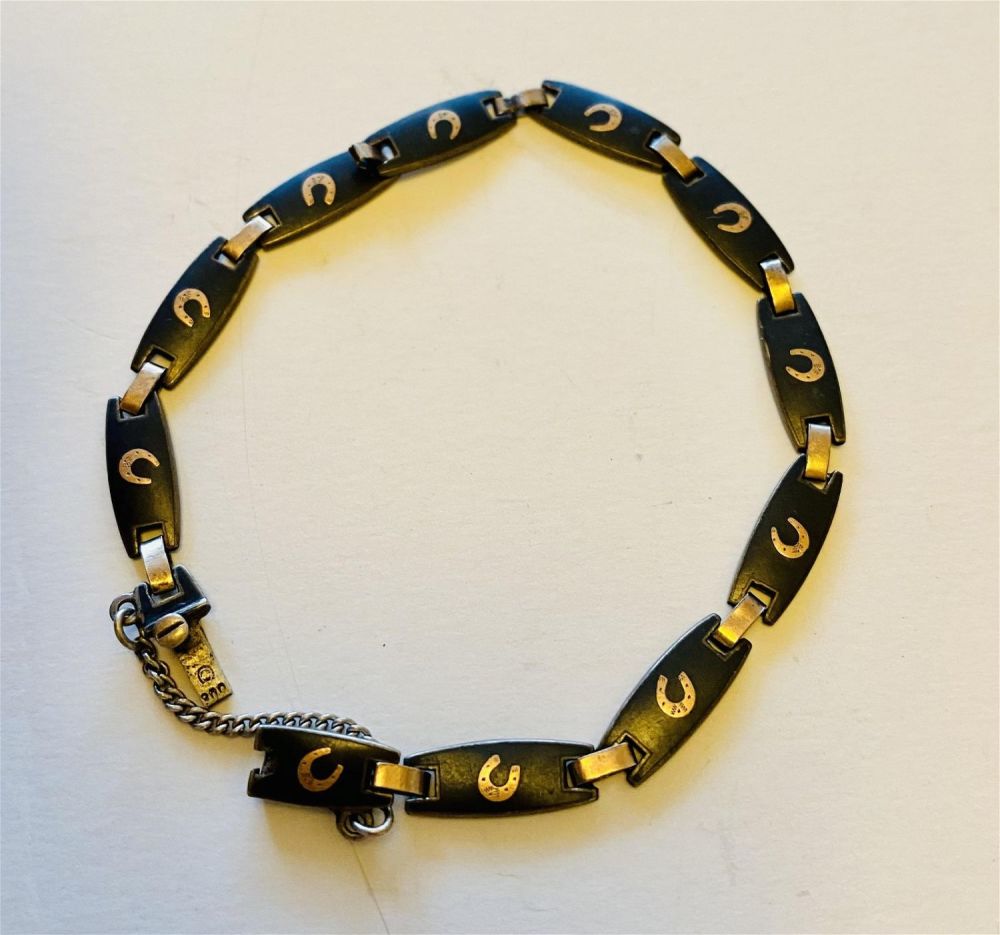 Lot 159: Sterling enamel horseshoe vintage bracelet