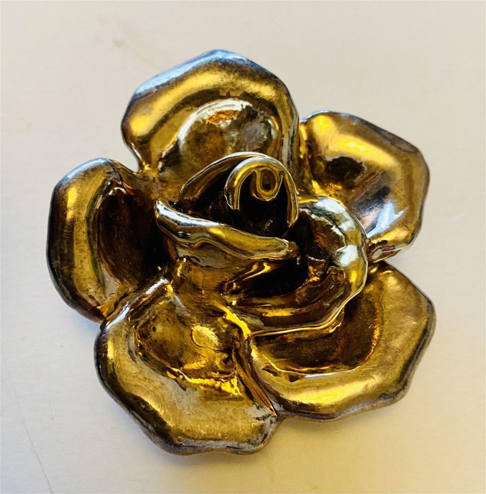 Lot 169: Rose large repousse sterling pin pendant