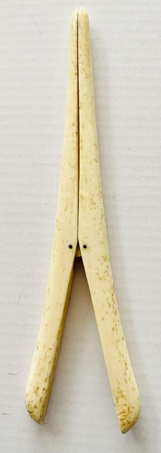 Lot 177: Bone glove stretcher Victorian