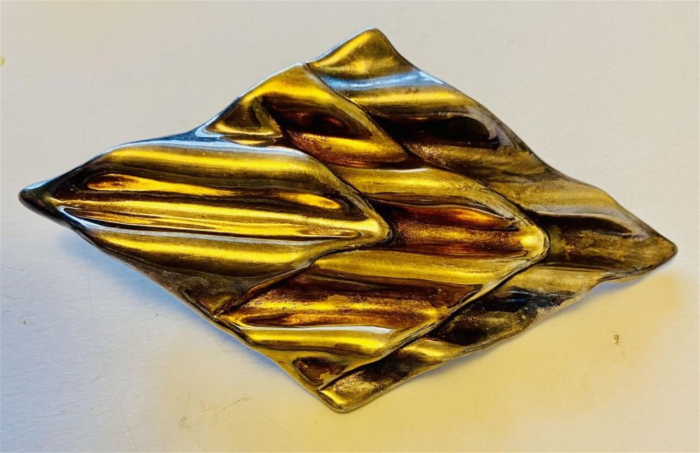 Lot 179: Large sterling wave pin pendant