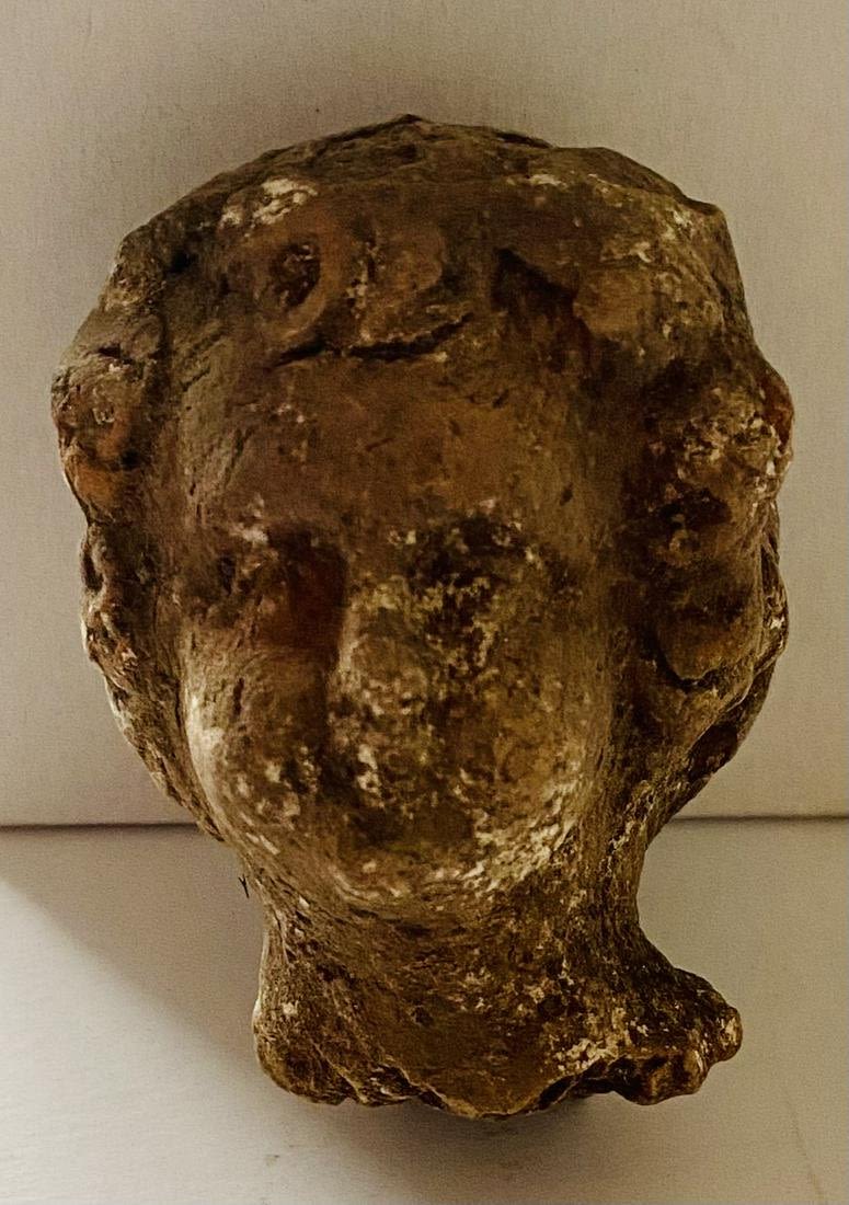 Lot 196: Clay head of woman
