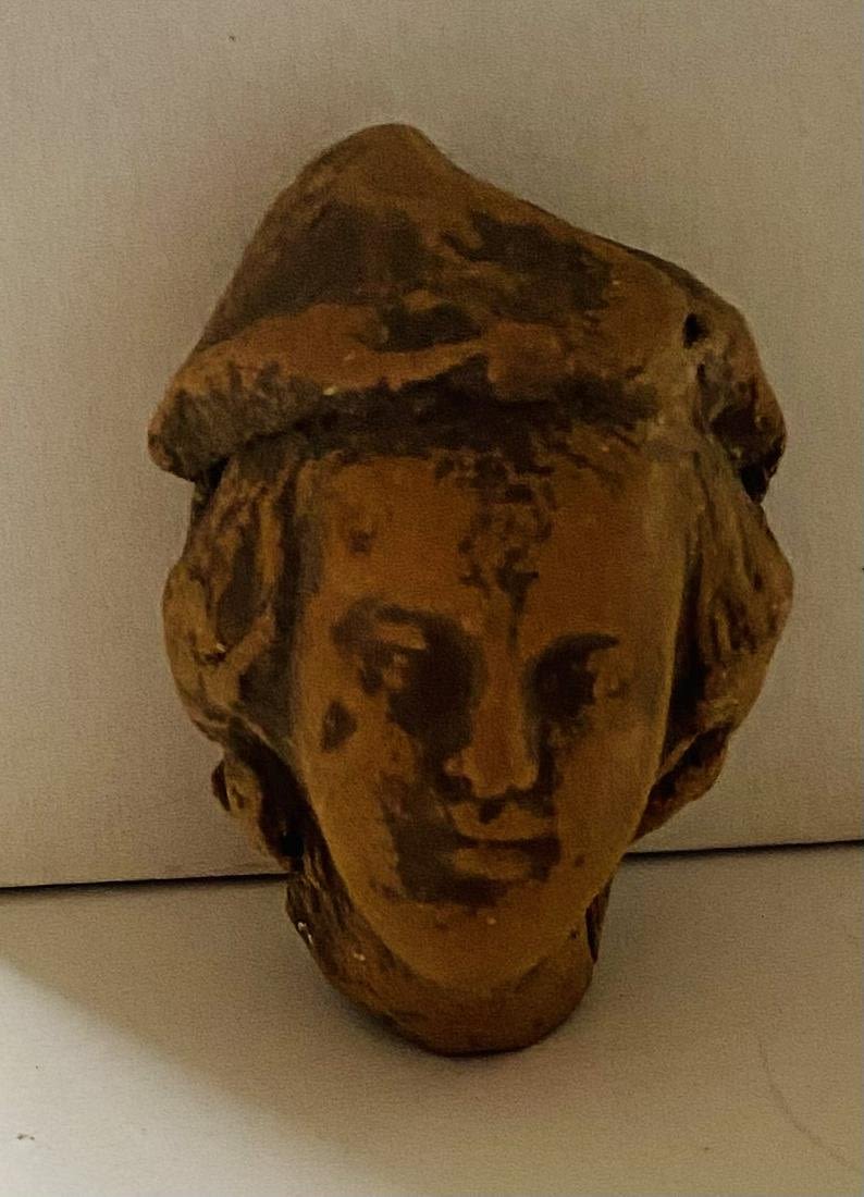 Lot 206: Terra cotta womans head Pre Columbian
