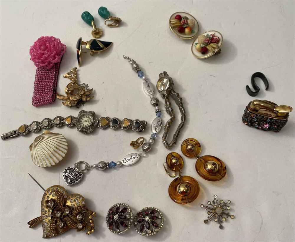 Lot 212: Costume jewelry, lighter , watches, earrings