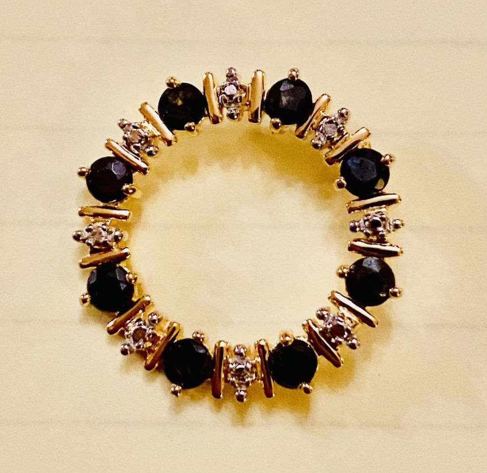 Lot 220: Vermeil sapphire circle pendant