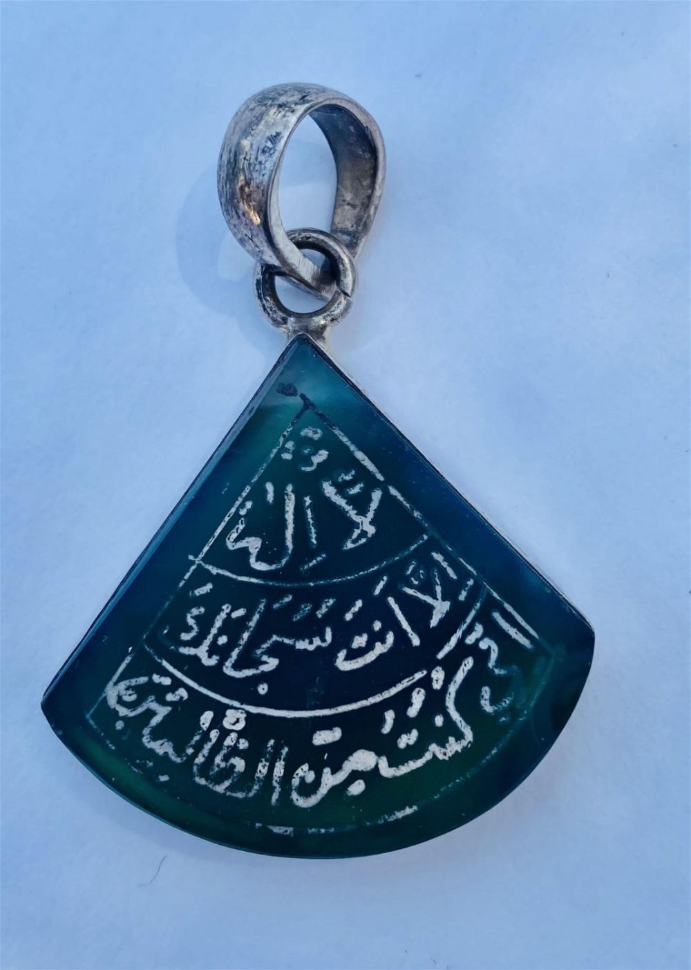 Lot 243: Green onyx pendant sterling fan design