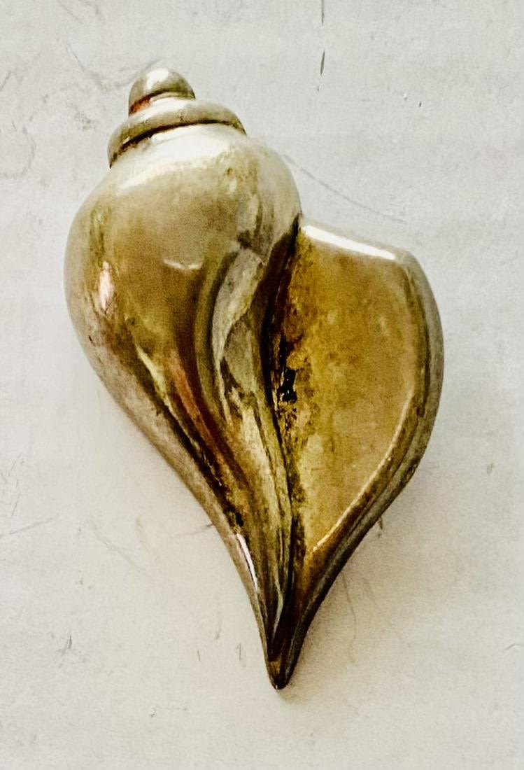 Lot 247: Shell signed sterling pendant