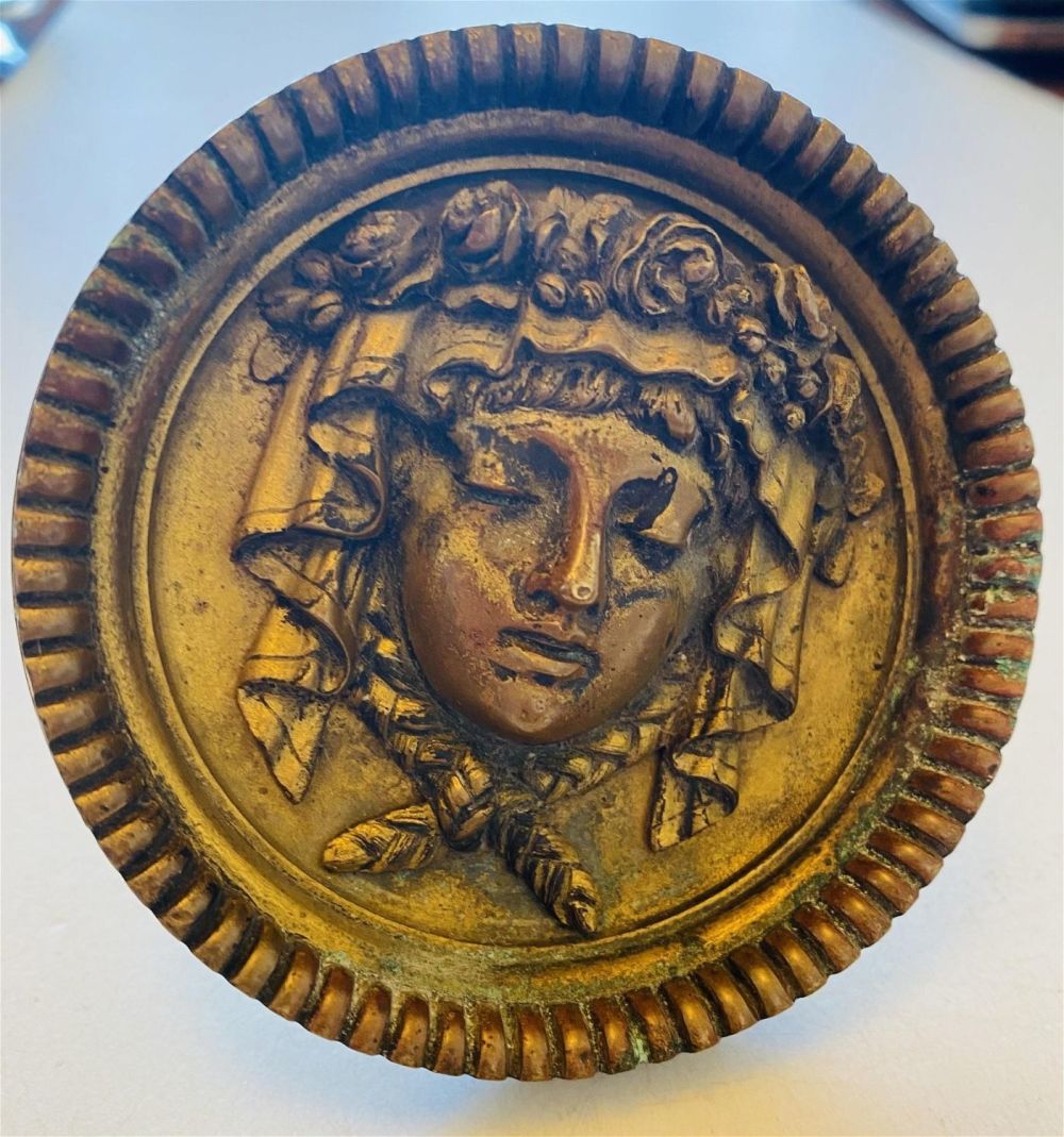 Lot 274: Antique bronze round wall holder