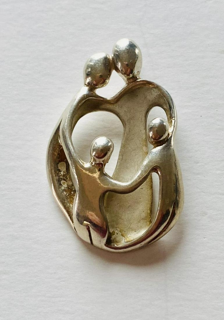 Lot 278: Lovers sterling hallmarked pendant