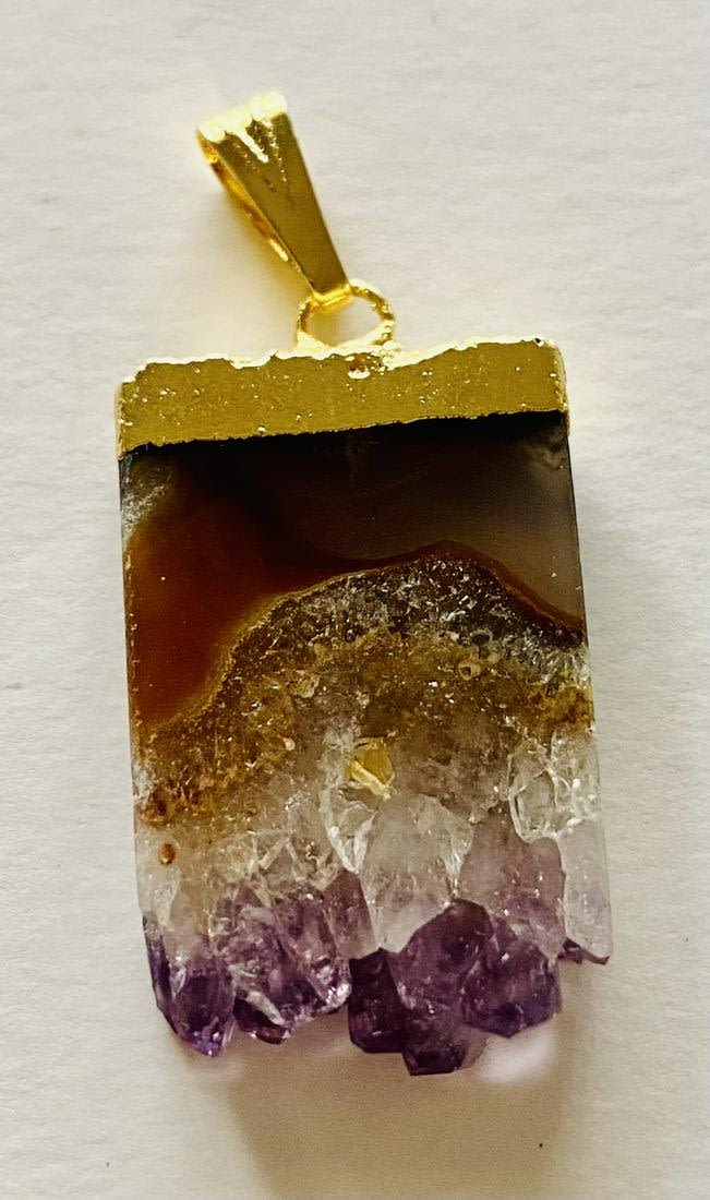 Lot 279: Amethyst sliced crystal pendant