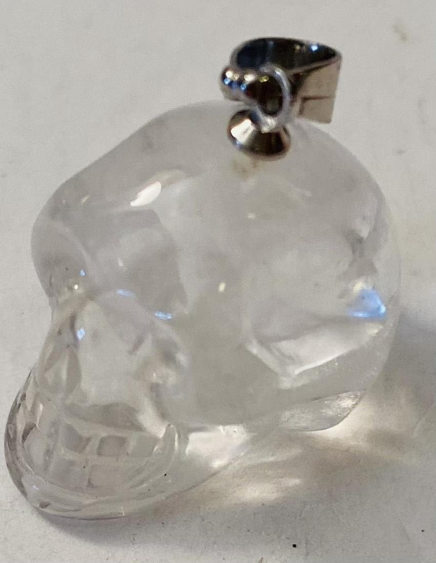 Lot 285: Clear quartz skull pendant