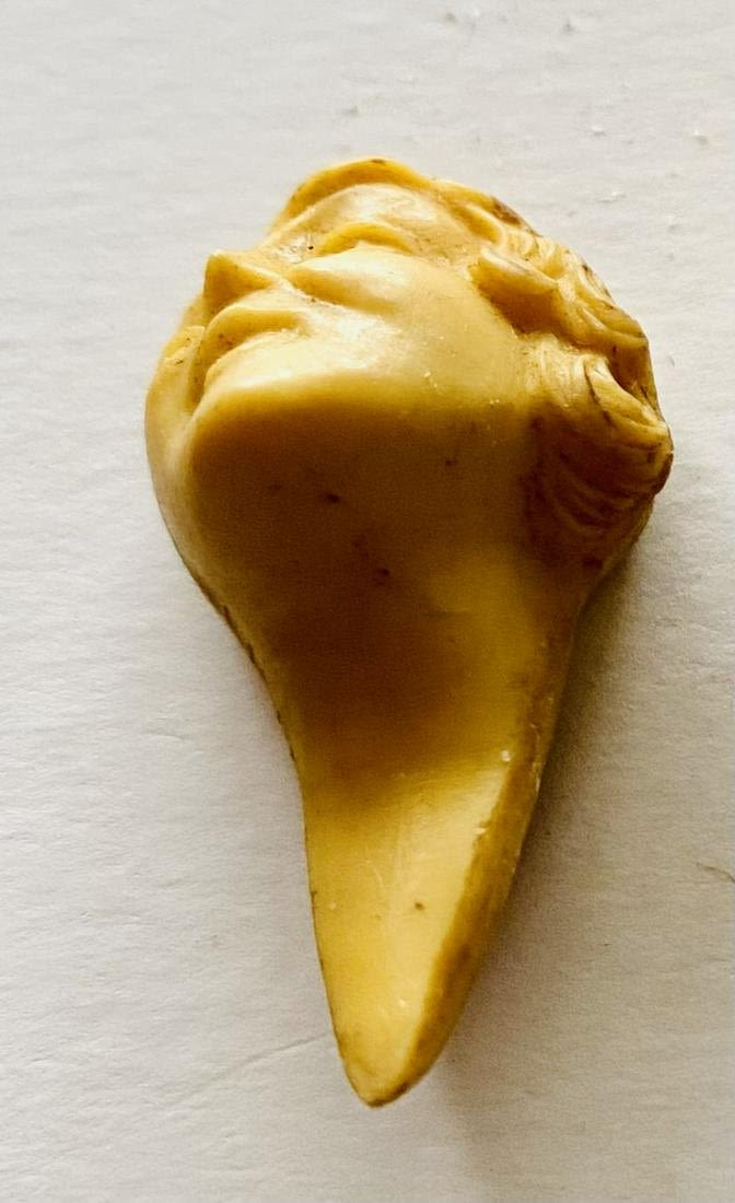 Lot 299: 3 vintage statue heads/faces