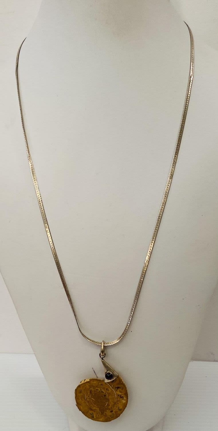 Lot 307: Fossil ammonite sterling necklace