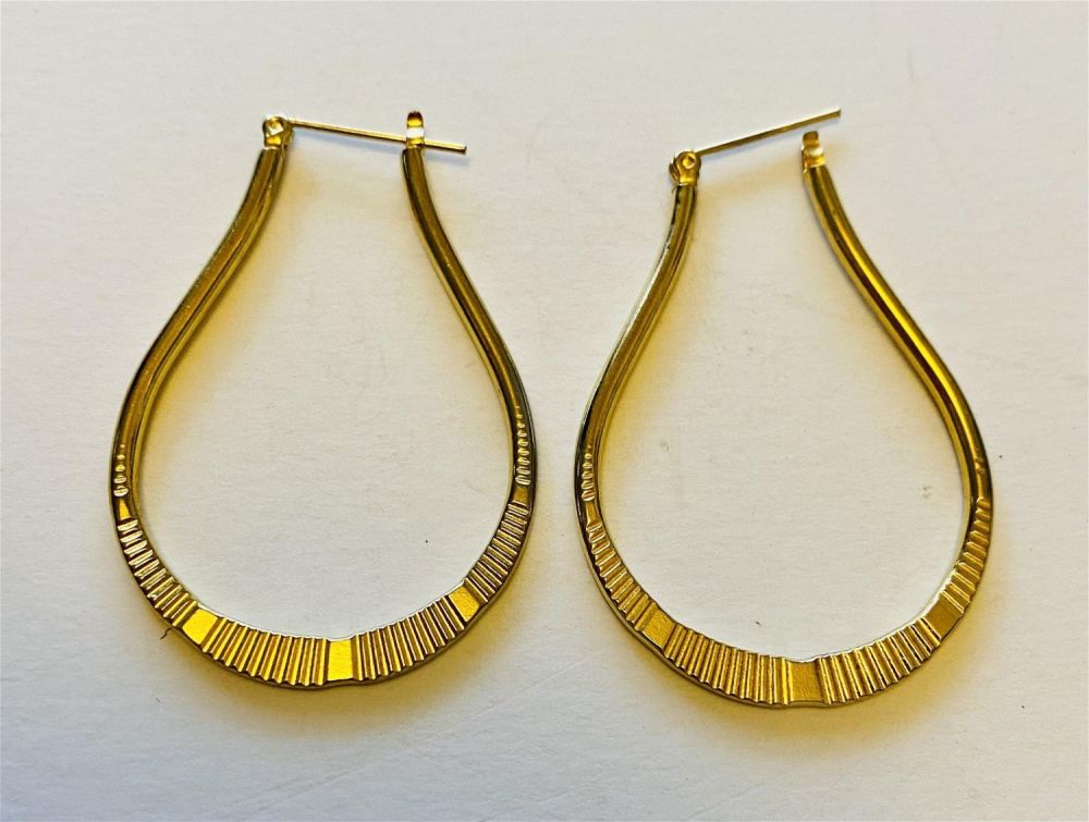 Lot 319: Gold fill earrings oval hoops