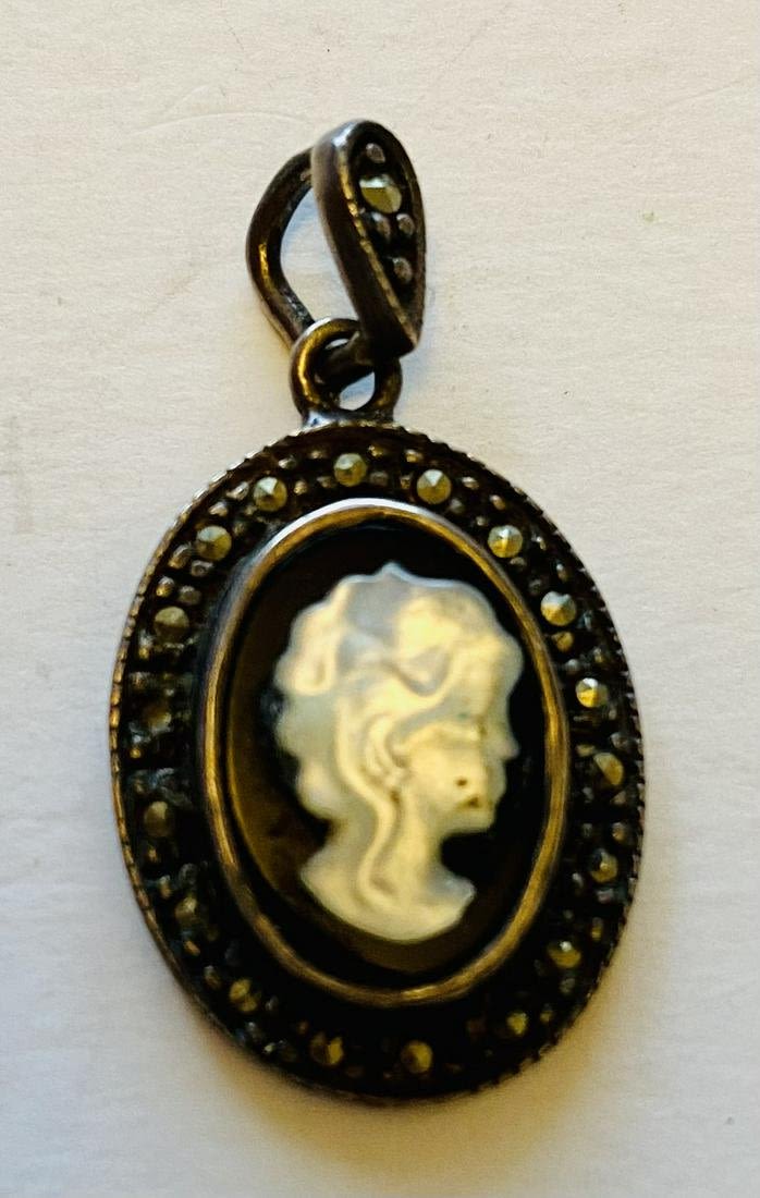 Lot 359: Cameo sterling marcasite pendant