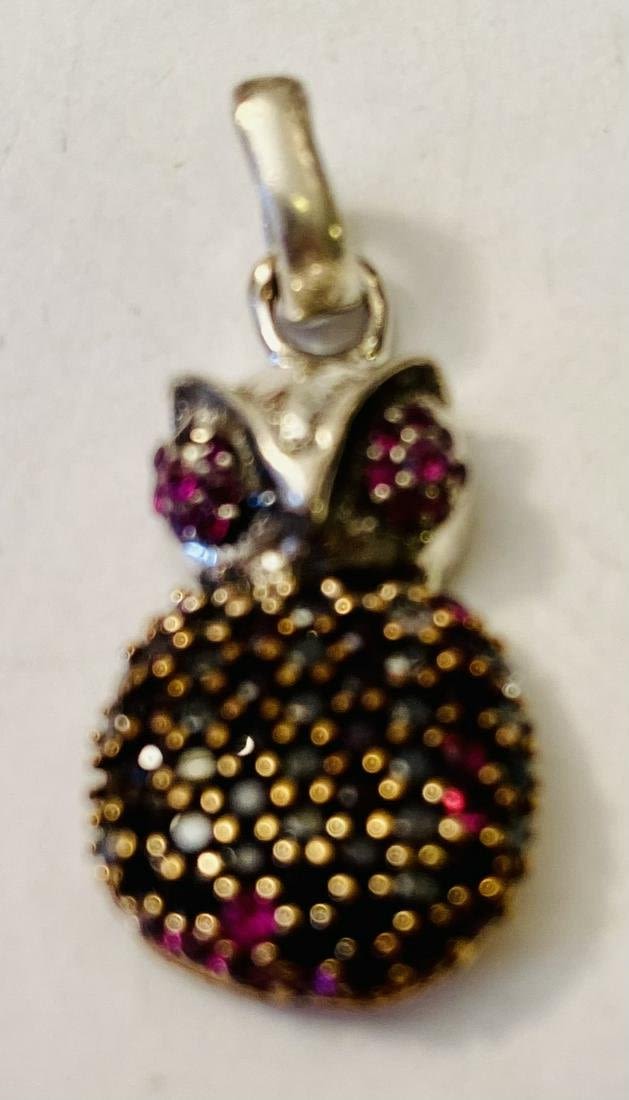 Lot 375: Owl ruby sterling pendant