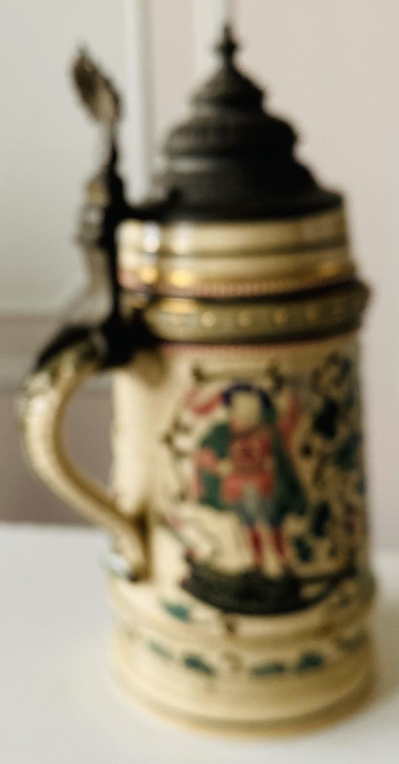 Lot 377: Old German stein with pewter lid