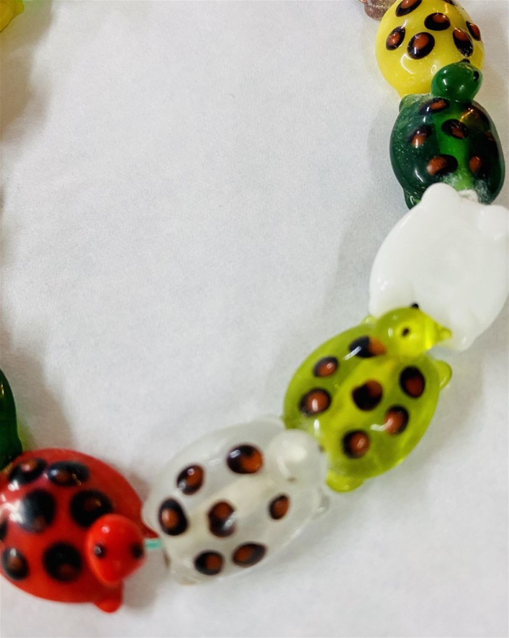 Lot 383: Turtle glass beads drilled