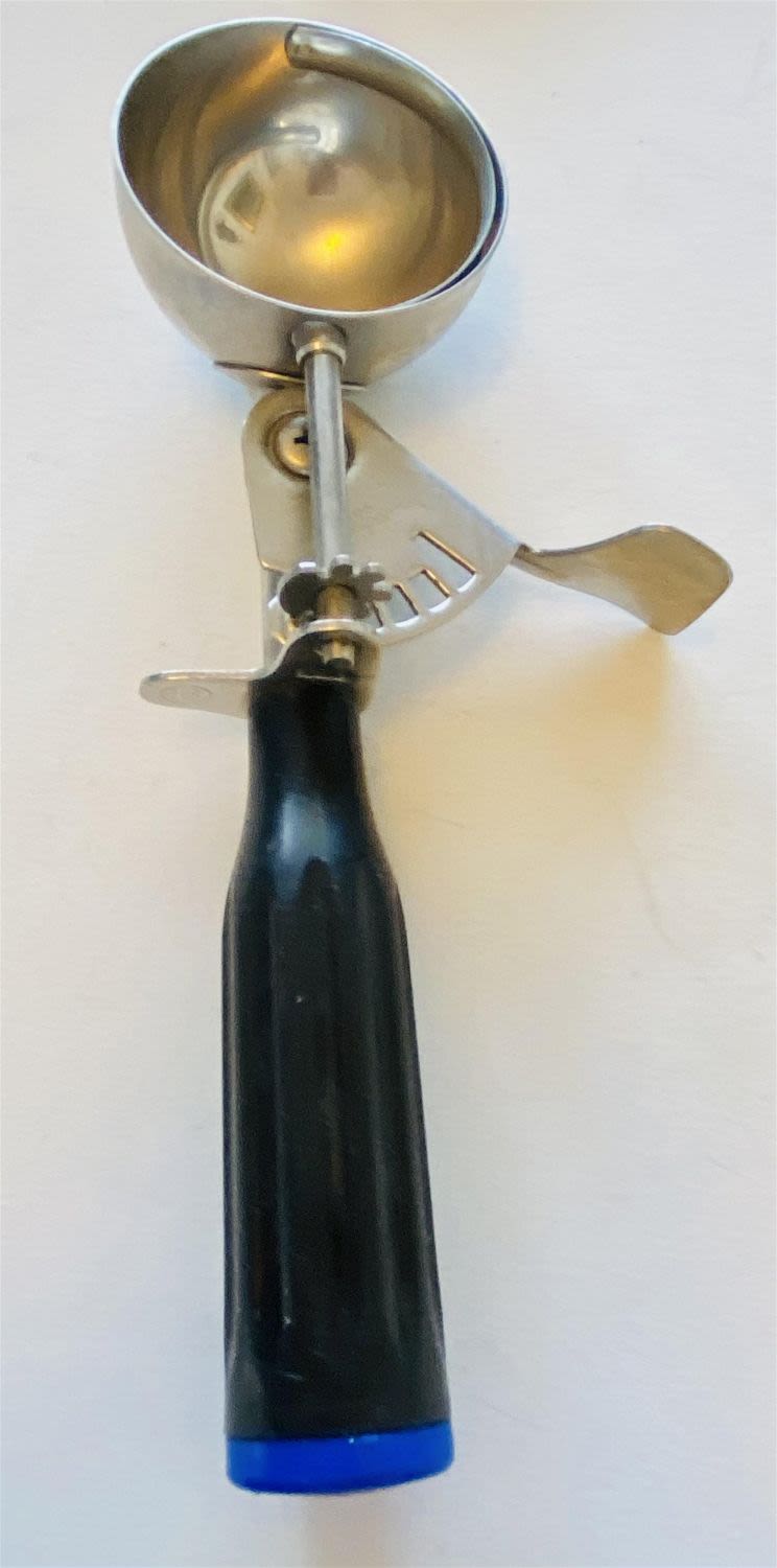 Lot 175: Antique ice cream dipper