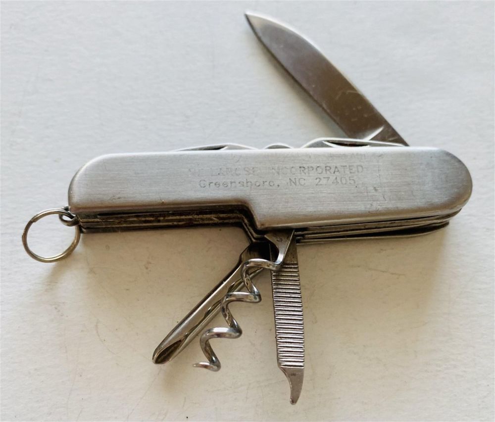 Lot 190: Silver pocketknife/many functions