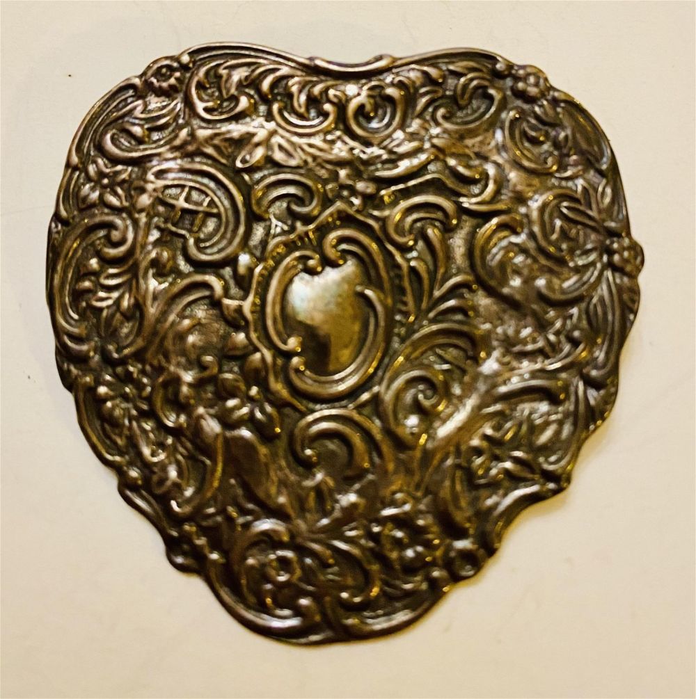Lot 195: Sterling heart vintage pin Toree