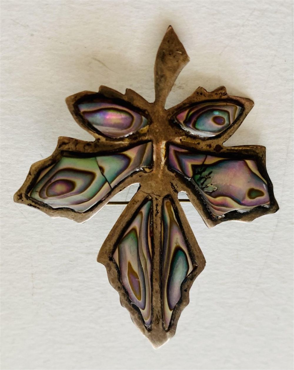 Lot 203: Vintage leaf pin abalone inlaid marked