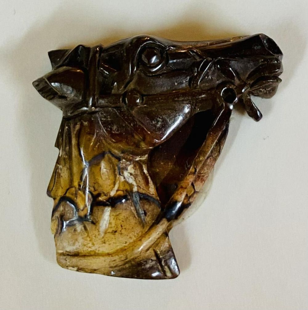 Lot 205: Horse head opalized carved