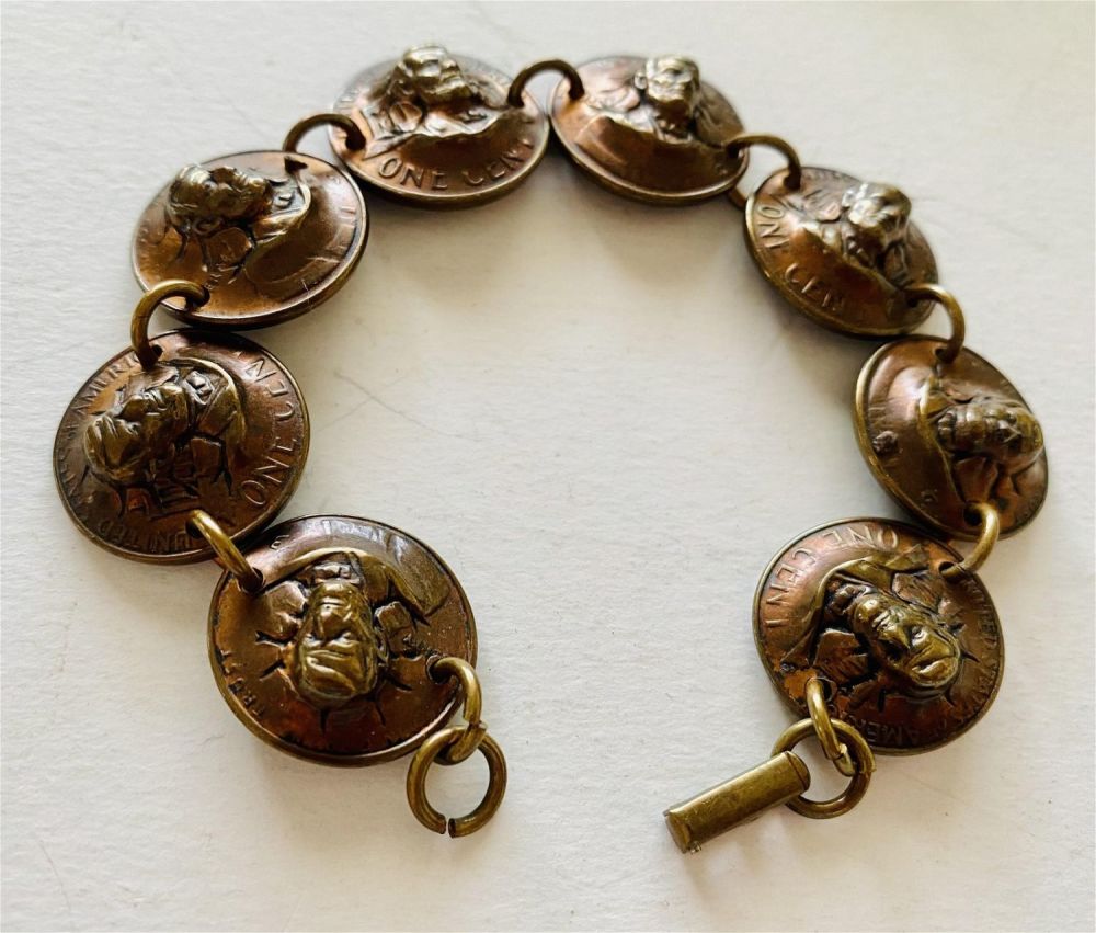 Lot 221: Penny bracelet with repousse Lincoln pennies