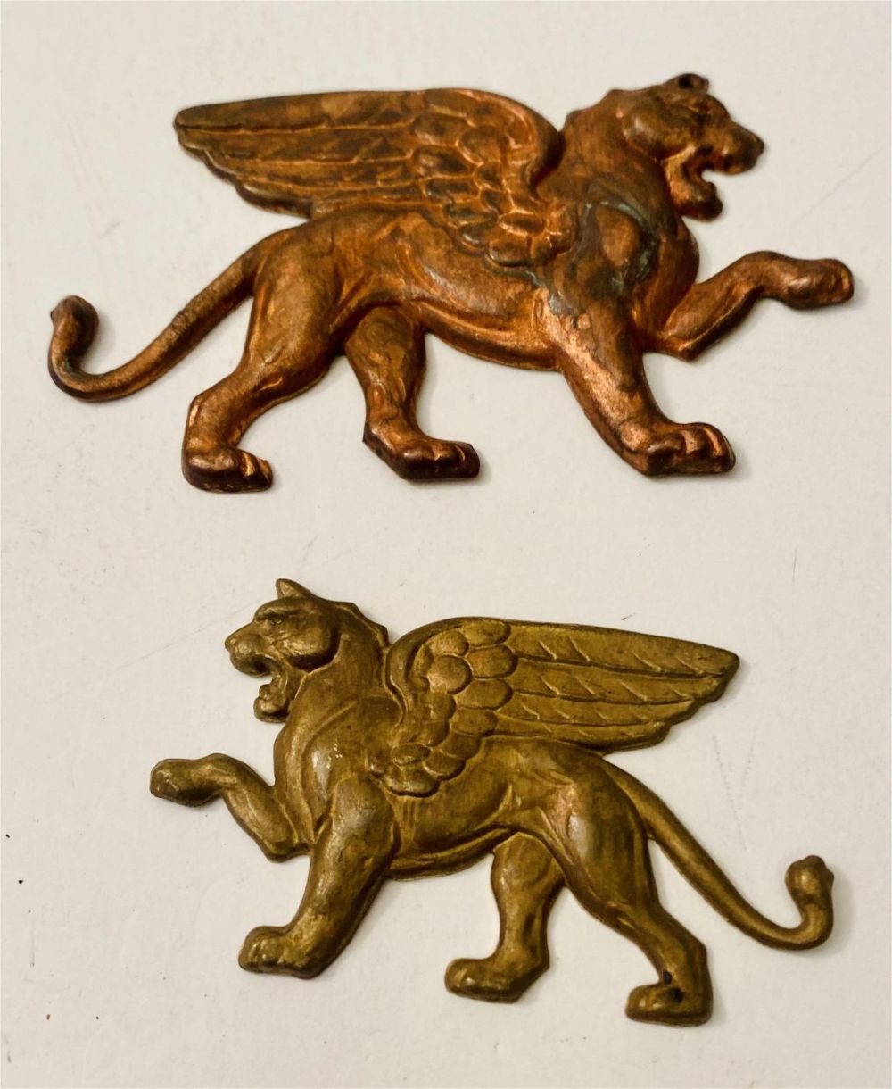 Lot 251: Repousse vintage griffin copper metal plaques