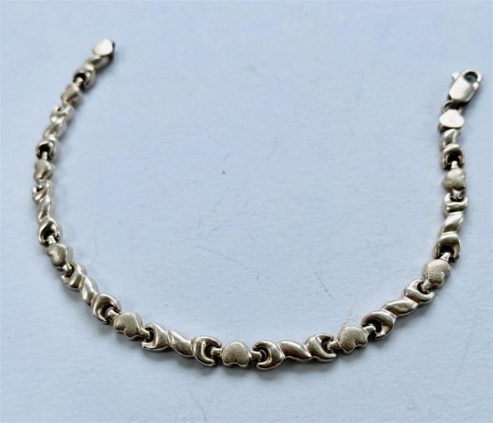 Lot 168: Sterling heart bracelet marked