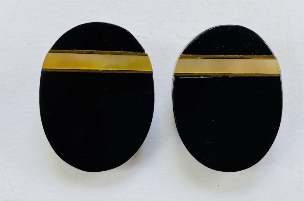 Lot 185: Onyx shell earrings designer