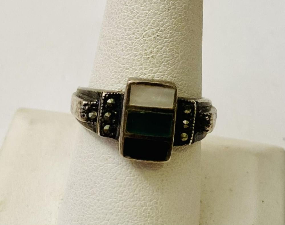 Lot 214: Sterling marcasite ring inlaid onyx, MOP,