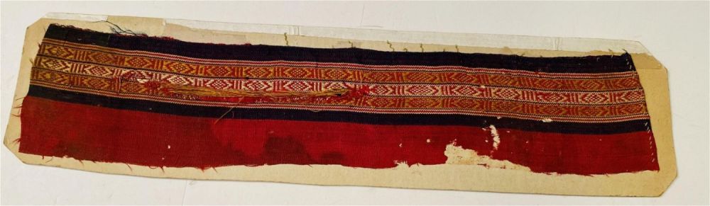 Lot 219: Coptic fabric Egyptian textile red