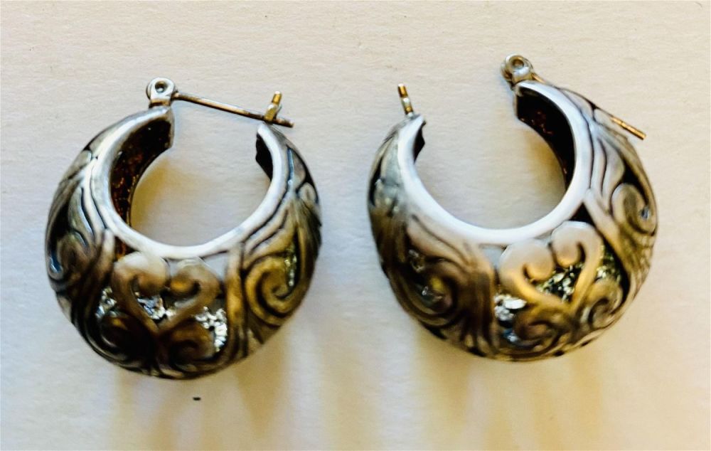 Lot 241: Sterling pierced design hoop earrings