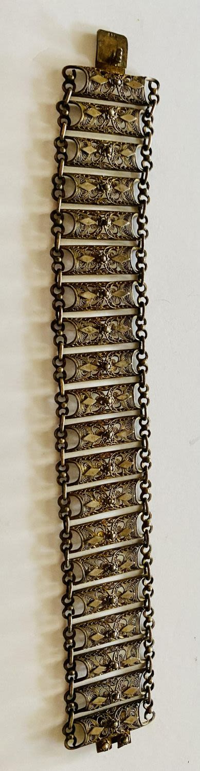 Lot 258: Sterling antique filigree bracelet