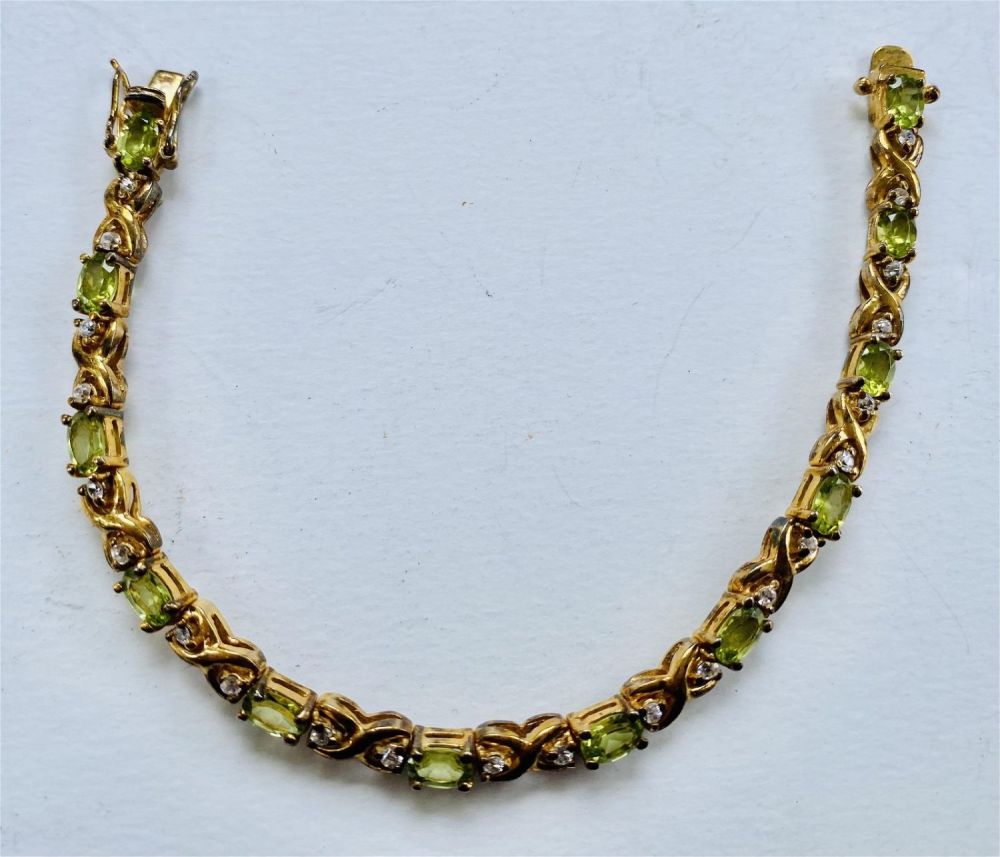 Lot 260: Peridot straightline sterling bracelet
