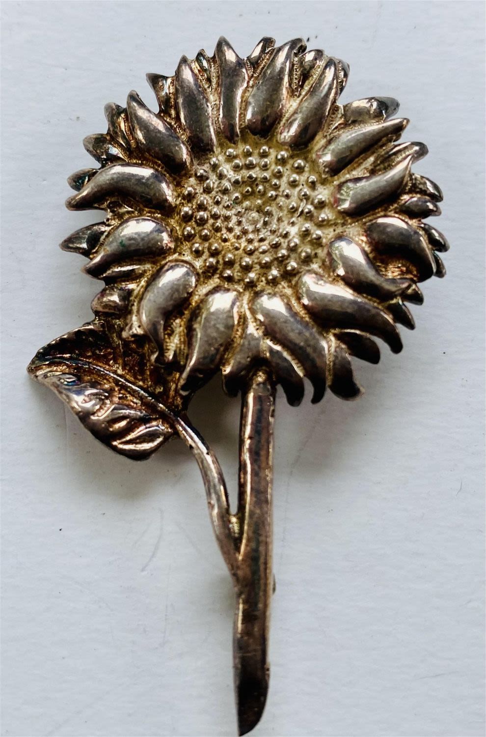 Lot 275: Sterling sunflower pin marked