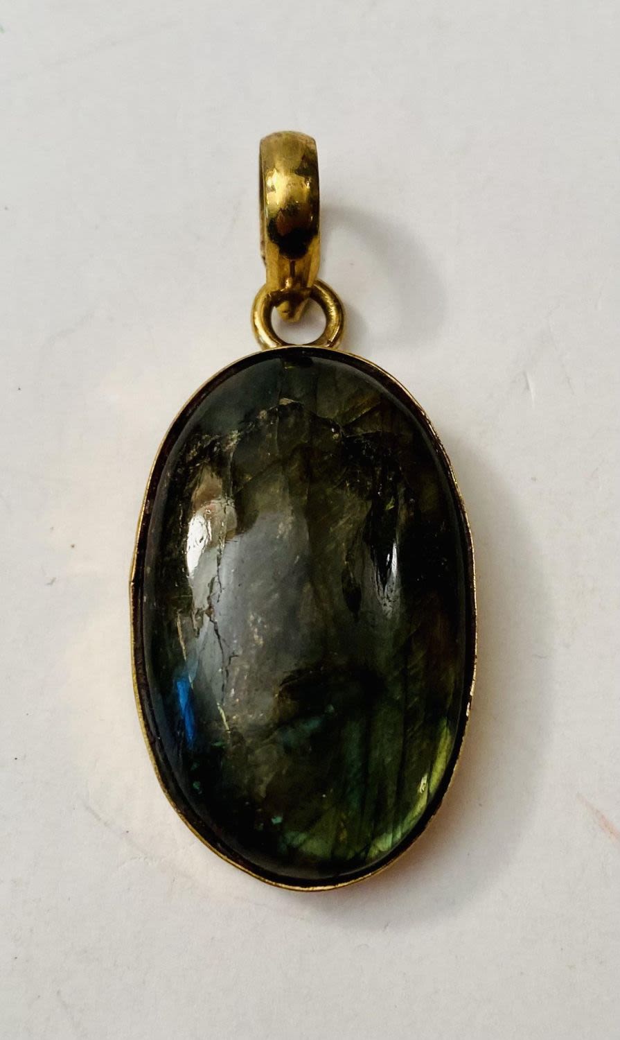 Lot 314: Labradorite oval pendant - 2 inches