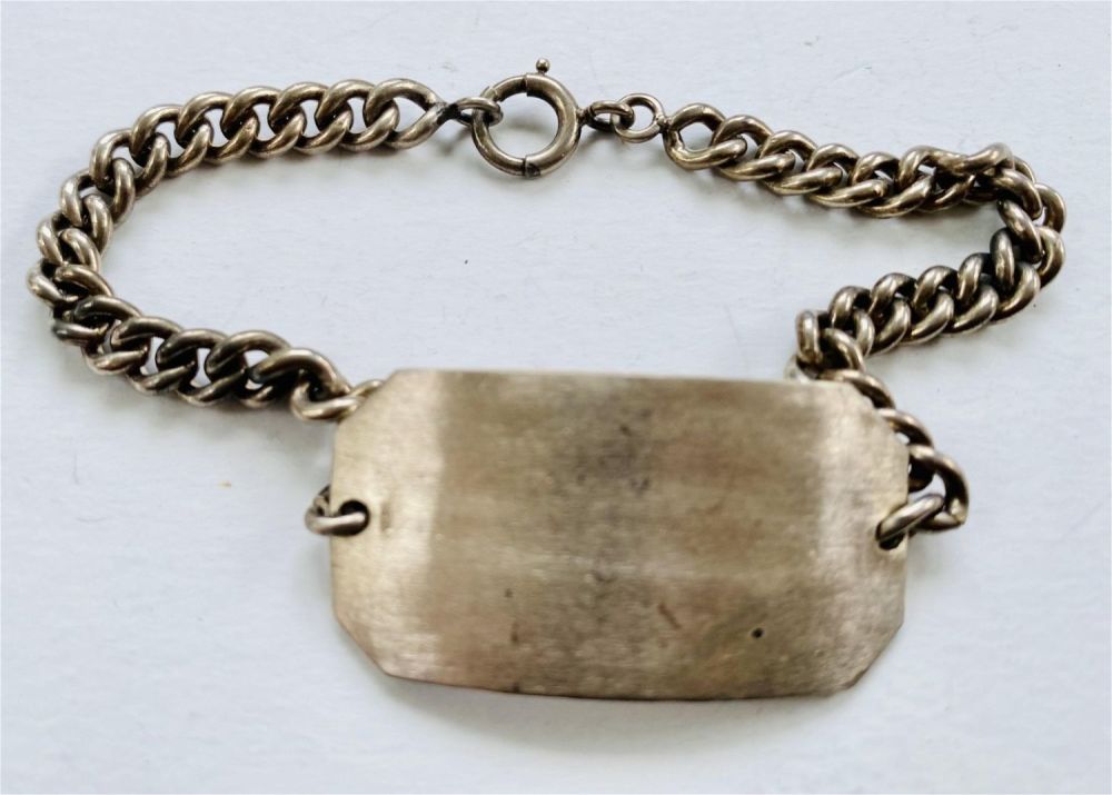Lot 325: Sterling ID bracelet - old