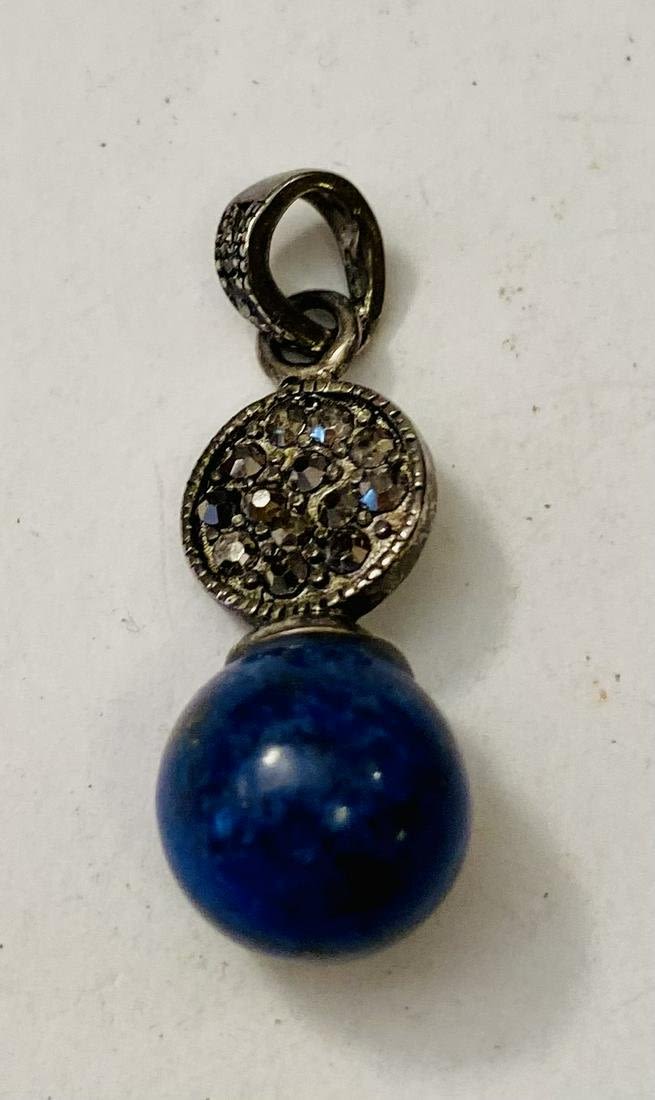 Lot 338: Lapis sphere drop marcasite pendant