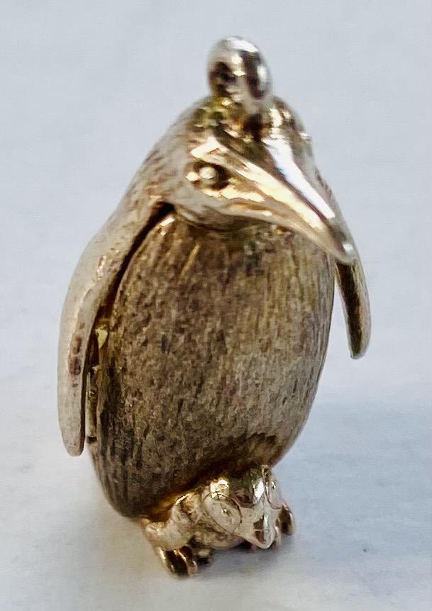 Lot 342: Penguin with baby charm vintge