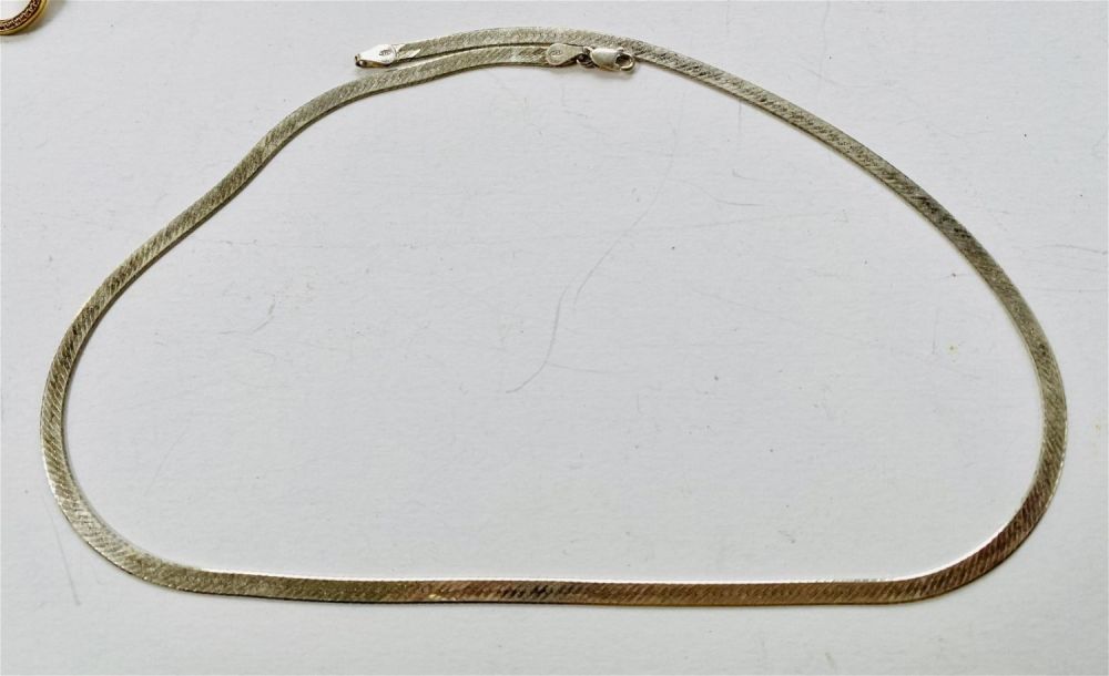 Lot 375: Herringbone sterling chain