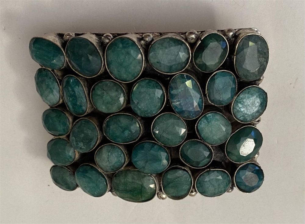 Lot 391: Emerald large belt buckle