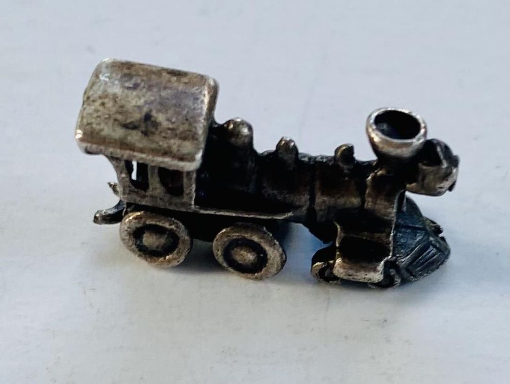 Lot 392: Sterling locomotive charm old