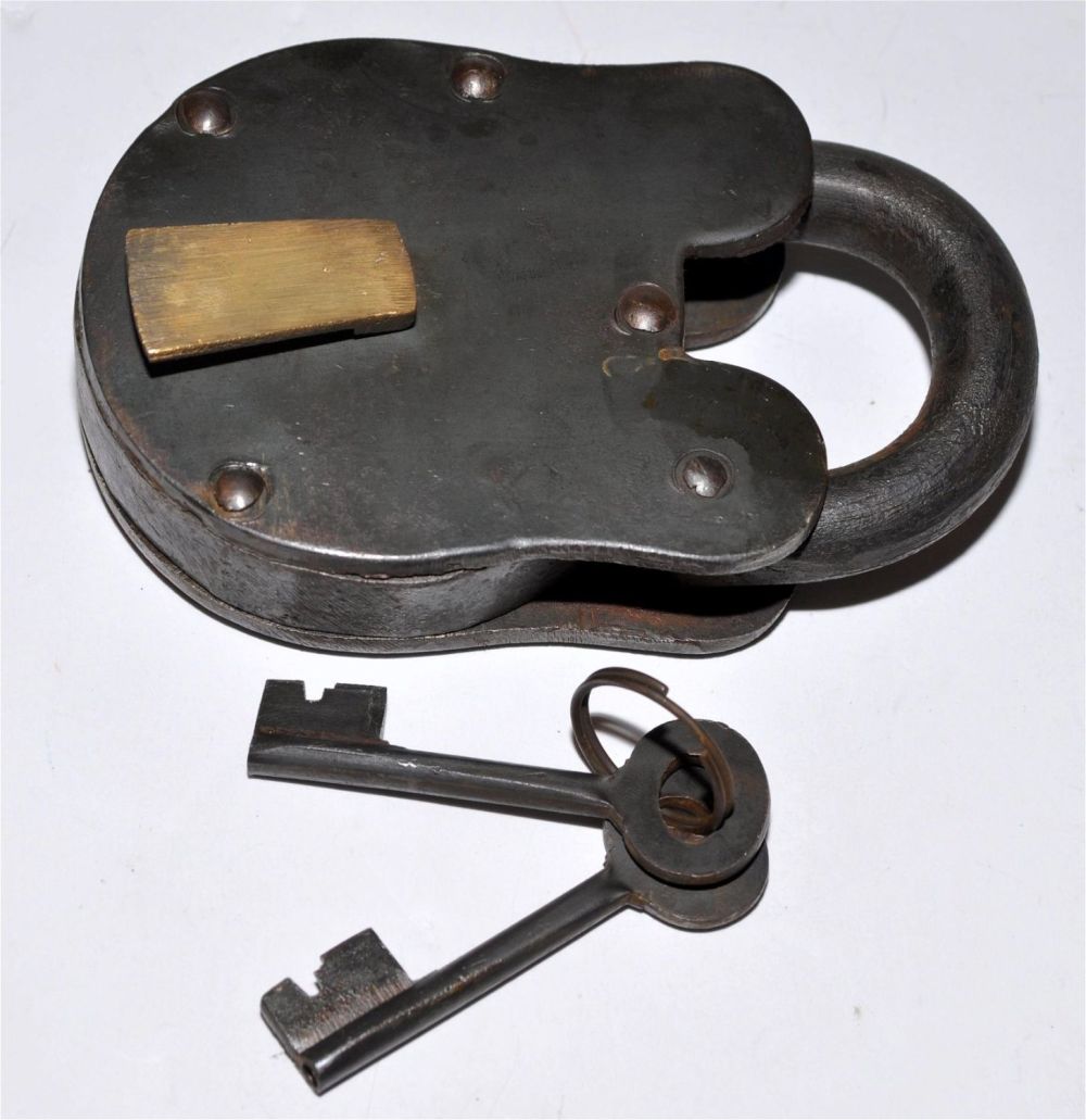 Lot 438: Brass padlock with keys