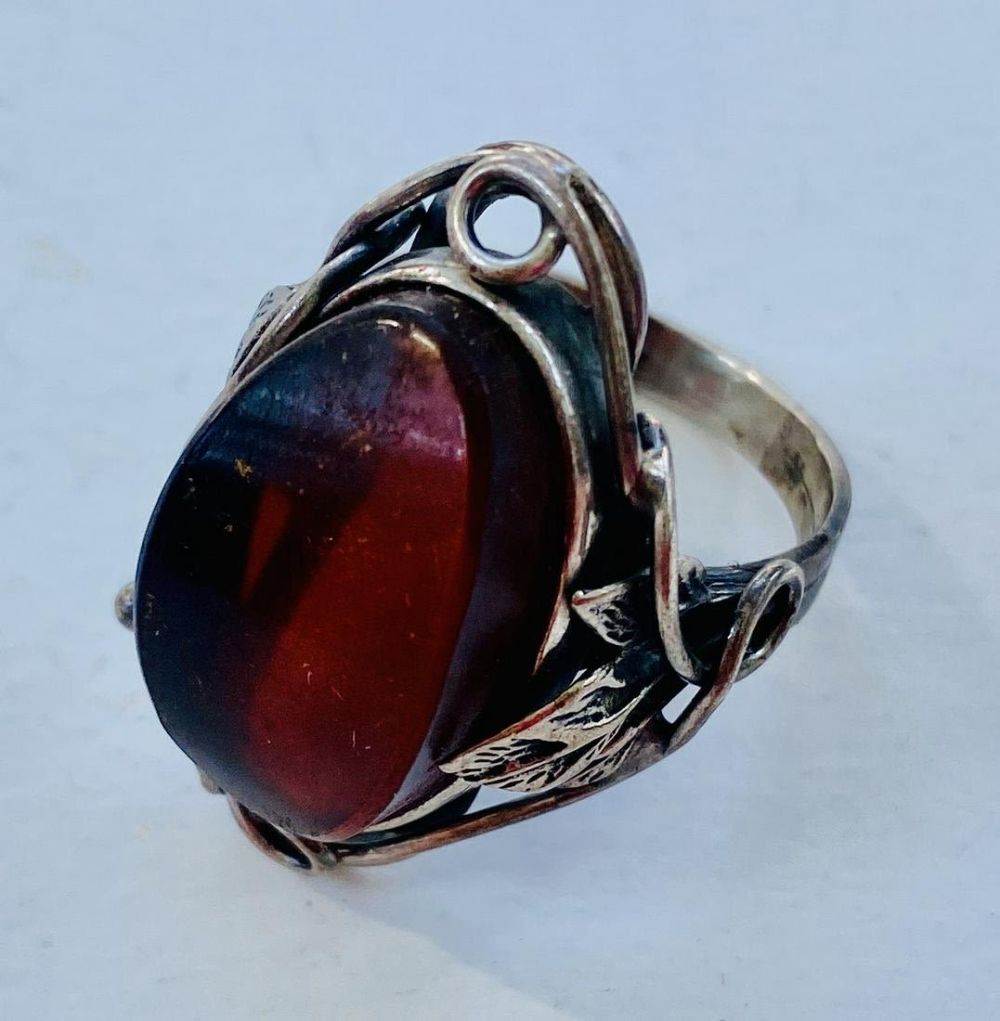 Lot 215: Sterling amber cabochon ring