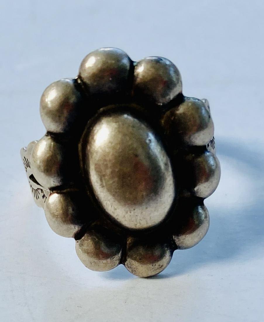 Lot 217: Sterling adjustable American Indian ring