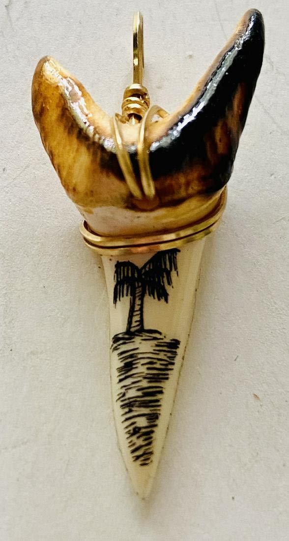 Lot 240: Shark tooth scrimshaw pendant
